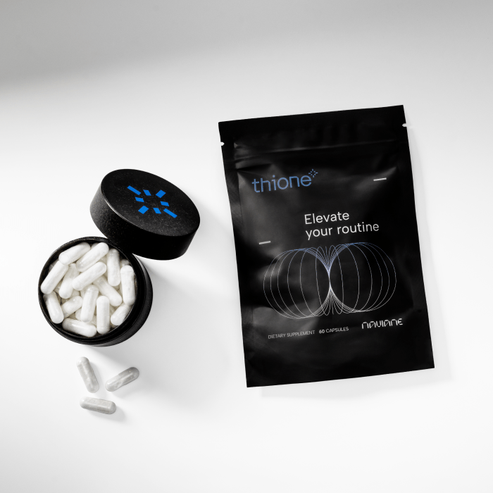 Black Thione pouch and jar against a light grey background.